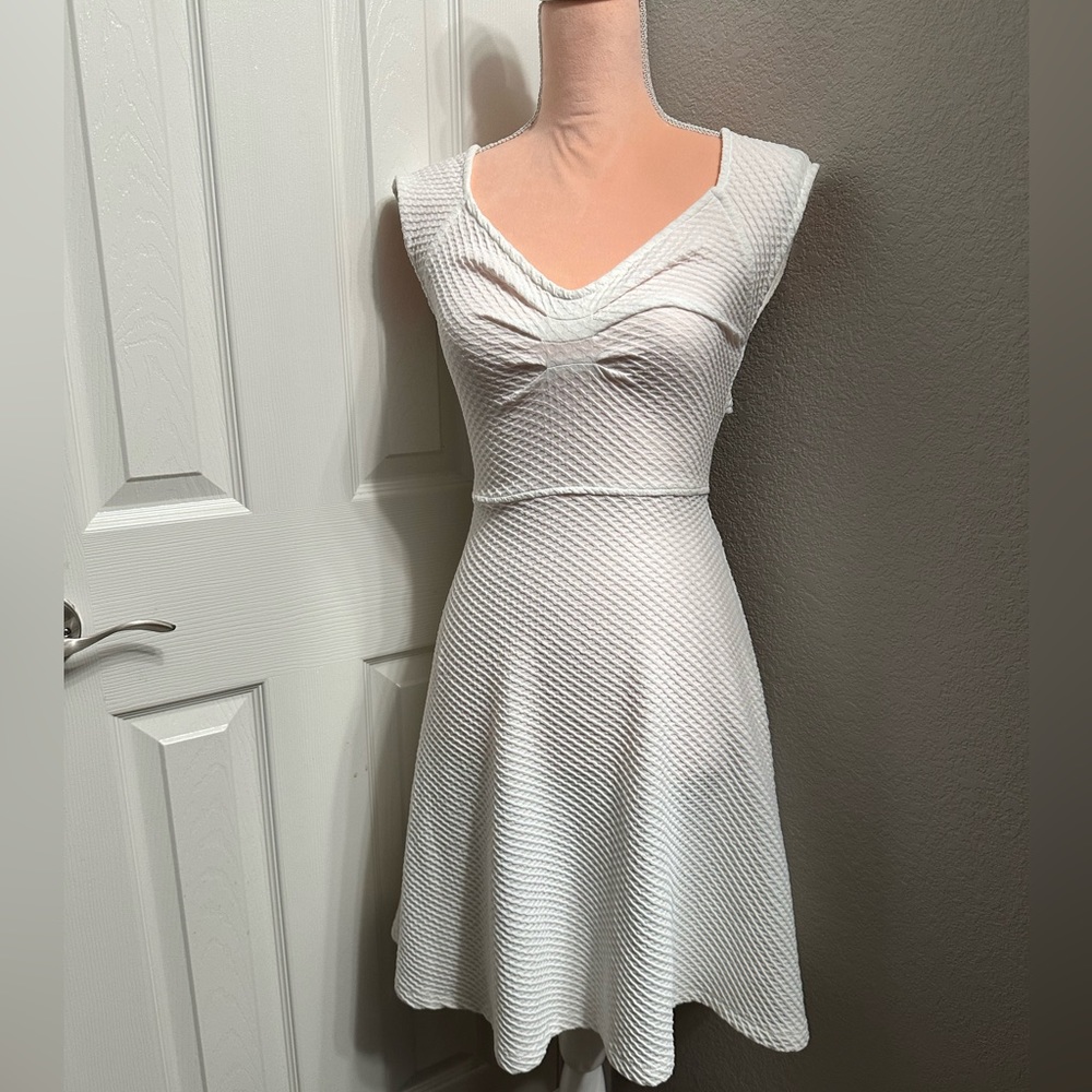 Too Good to Be True Criss Cross Cut Back Ribbed Mini Dress